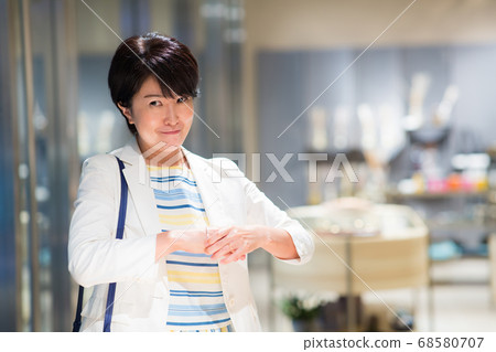 Women in their 40s enjoying shopping Women in their 40s enjoying shopping 68580707