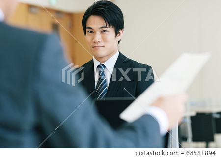 Business man receiving an interview 68581894