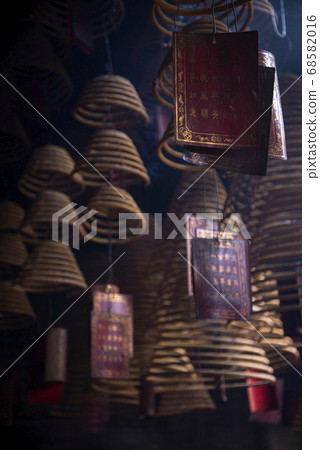 traditional  burning incense coils inside chinese 68582016