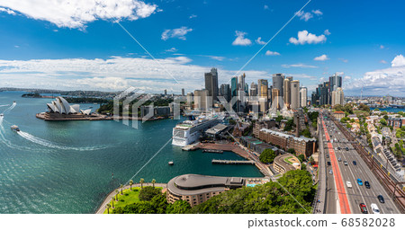 Sydney harbor bay and Sydney downtown skyline with opera house in a beautiful afternoon, Sydney, Australia Sydney harbor bay and Sydney downtown skyline with opera house in a beautiful afternoon, Sydney, Australia 68582028
