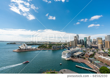 Sydney harbor bay and Sydney downtown skyline with opera house in a beautiful afternoon, Sydney, Australia. Sydney harbor bay and Sydney downtown skyline with opera house in a beautiful afternoon, Sydney, Australia. 68582030