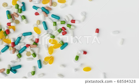 Many different colored tablets, capsules isolate on white background. Health care concept. Antibiotics inside pills, vitamins. Goods from pharmacy. Pharmaceutical company, industry, 3d illustration 68584328