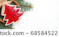 Christmas decorations and branches of a New Year tree on abstract background 68584522