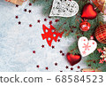 Christmas decoration collection: hearts, branches and bauble decor on stone background. Xmas backdrop for your greeting card with space for text 68584523