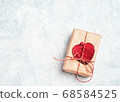 Valentine's Day Gift box with a red bow and heart 68584525