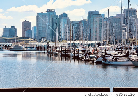Beach yachts and high rise apartments 68585120