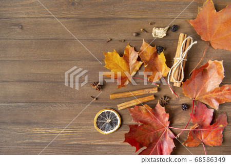 red and yellow autumn maple leaves, anise, a slice 68586349