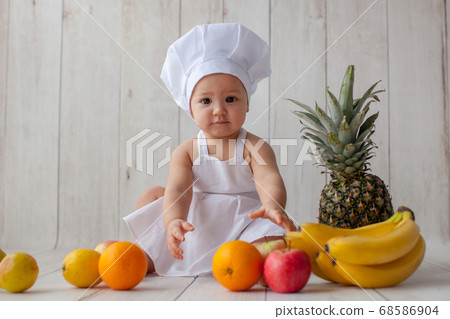 One year old baby. Little chef. One year old baby. Little chef. 68586904
