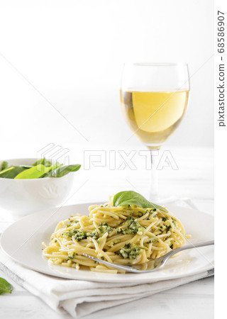 pasta with spinach and cheese on a plate on a pasta with spinach and cheese on a plate on a 68586907