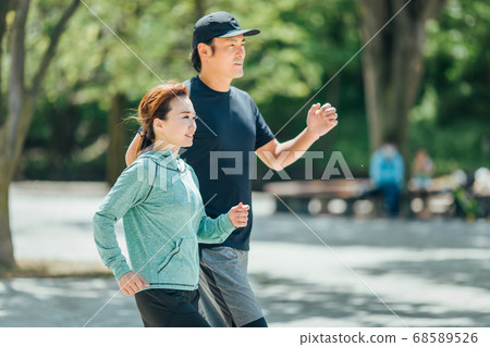 Men and women walking Men and women walking 68589526