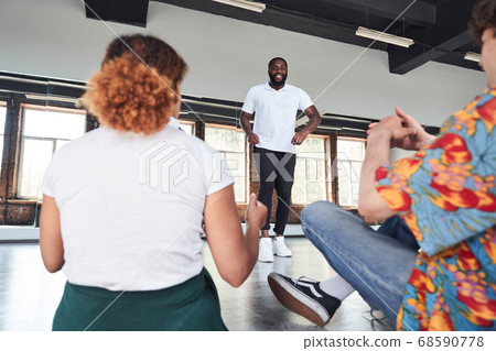 Happy Afro American man showing new dance 68590778