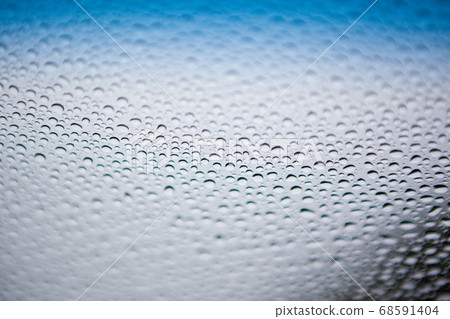 Raindrops on the windshield 68591404