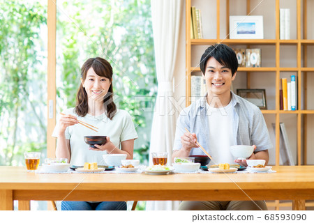 Young couple dining Young couple dining 68593090