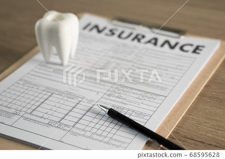 insurance policy and pointing examining insurance 68595628