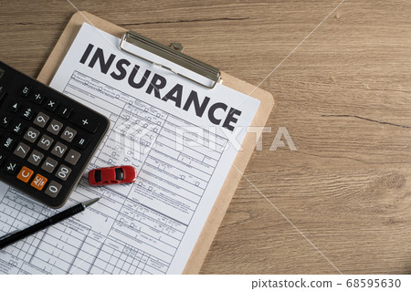 insurance policy and pointing examining insurance 68595630