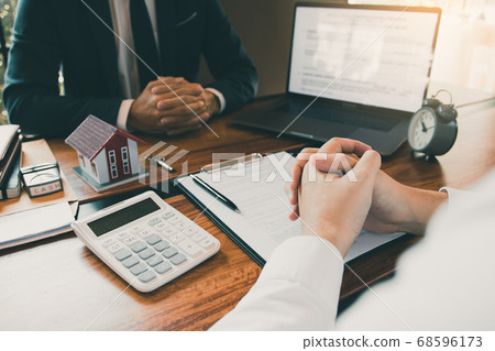 House sales representative sat at the office with 68596173