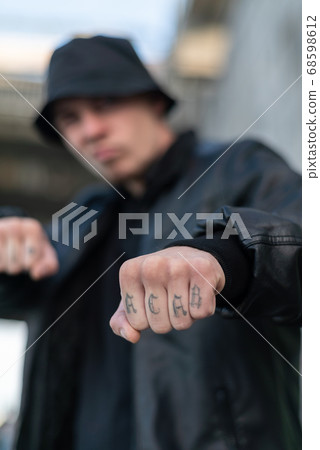 ACAB tattoo on the arm of a bully man ACAB tattoo on the arm of a bully man 68598612
