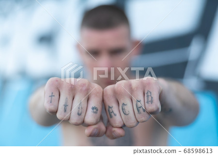 ACAB tattoo on the arm of a bully man ACAB tattoo on the arm of a bully man 68598613