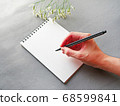 Stylish chic image with memo and pen flowers on gray background 68599841