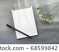 Stylish chic image with memo and pen flowers on gray background 68599842