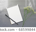 Stylish chic image with memo and pen flowers on gray background 68599844