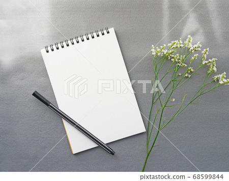Stylish chic image with memo and pen flowers on gray background Stylish chic image with memo and pen flowers on gray background 68599844