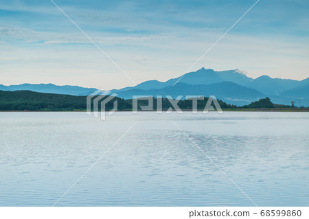 Mountains, clouds, mist, water bodies and beautiful sky in nature give a feeling of loneliness in Thailand. 68599860