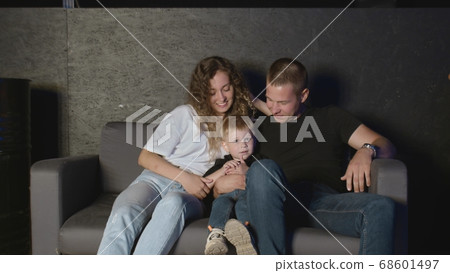 Happy family enjoy their free time relax together at home. Happy family enjoy their free time relax together at home. 68601497