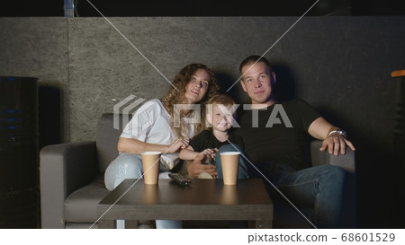 Happy family enjoy their free time relax together at home. Happy family enjoy their free time relax together at home. 68601529