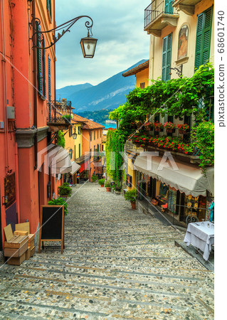 Stunning scenic street with colorful houses and flowers in Bellagio 68601740