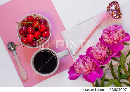 Still life with cup of coffee, sweet cherries and Still life with cup of coffee, sweet cherries and 68603607
