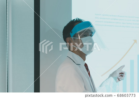 Presentation of men in white coat 68603773