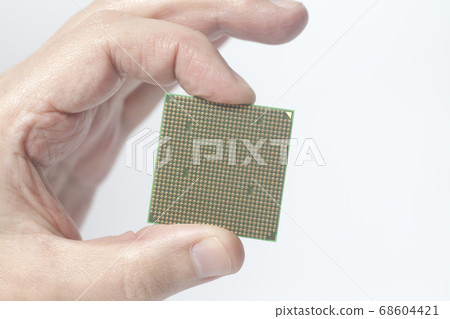 Central processing unit CPU microchip male hand 68604421