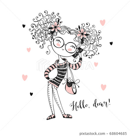 Trendy cute teen girl with curly hair talking on 68604685