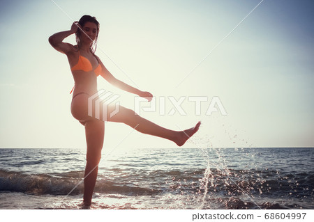 Summer beach vacation holidays woman happy joyful Summer beach vacation holidays woman happy joyful 68604997