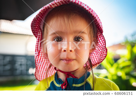 Portrait of very sweet little child with big eyes. 2 year old baby girl. Portrait of very sweet little child with big eyes. 2 year old baby girl. 68606151