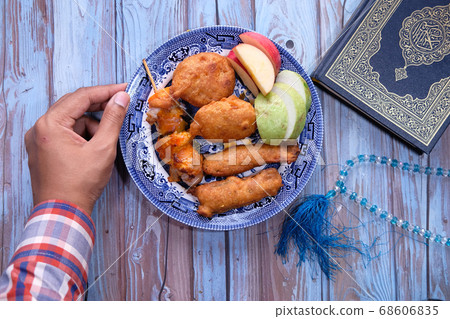 high angle view of Ramadan food in a plate high angle view of Ramadan food in a plate 68606835