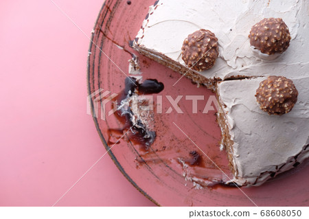 Top view of slice of chocolate cake on plate. 68608050