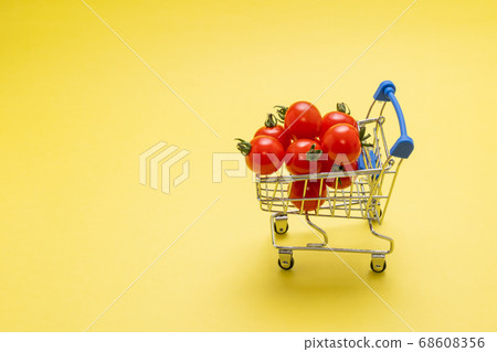 A heap of cherry tomatoes on a cart, like shopping A heap of cherry tomatoes on a cart, like shopping 68608356