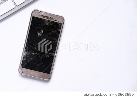 broken smart phone with empty screen on white background  68608690