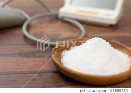 Large amount of salt and blood pressure monitor Large amount of salt and blood pressure monitor 68609753