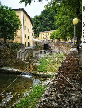 vertical river in italy town village of Porretta near Bologna in Emilia Romagna vertical river in italy town village of Porretta near Bologna in Emilia Romagna 68609882