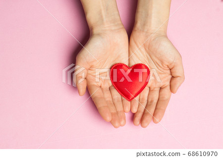hands holding heart hands holding heart 68610970