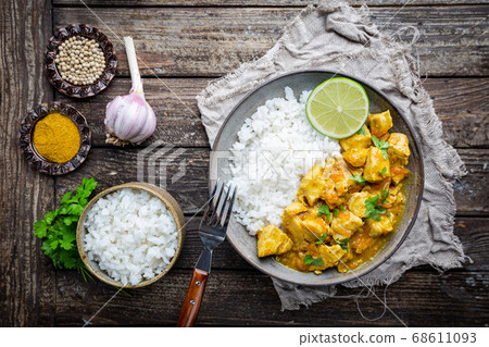 chicken cooked with curry sauce chicken cooked with curry sauce 68611093