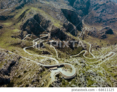 Road in the mountains. Beautiful landscape. Spain, Majorca. Aerial view from a drone. 68611125