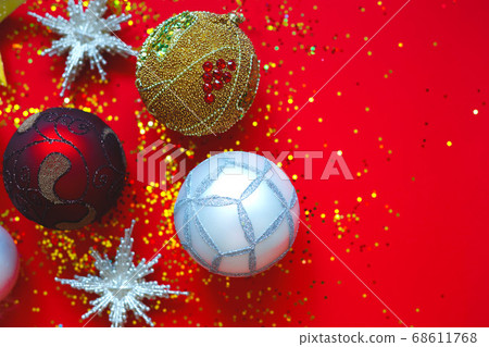 Beautiful Christmas balls and stars on a red 68611768