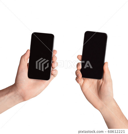 Smartphones with blank screens in male hands isolated on white background, mock up for design. Collage Smartphones with blank screens in male hands isolated on white background, mock up for design. Collage 68612221