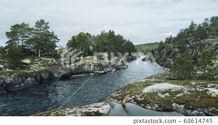 View of a beautiful canyon, lake and pine forest View of a beautiful canyon, lake and pine forest 68614745