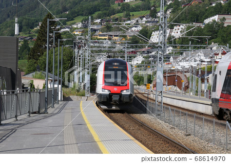 Norway Norwegian Railway Train to Mudal entering Voss Station on Bergen Line Norway Norwegian Railway Train to Mudal entering Voss Station on Bergen Line 68614970