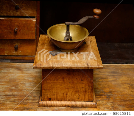 Antique manual wooden coffee grinder 68615811